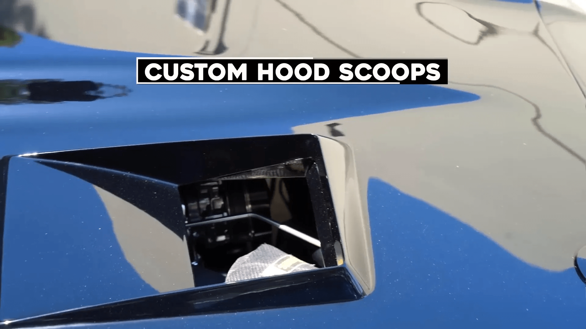 Custom hood scoops on the Camaro